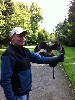 Todd Ouzts flying one of the baby hawks recently. The young hawks still see no reason to stop squawking while flying!!