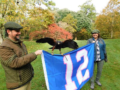 Another great photo from Sean & Angela Kimmel. Here is Bagun getting acquainted with the Seattle Seahawks 12 man flag! 